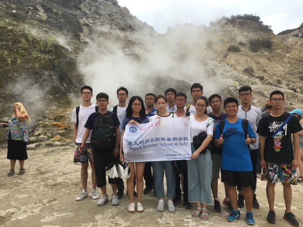 A group photo of our students next to a eruptive vocano.